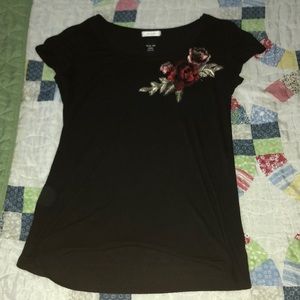 black t-shirt with flower